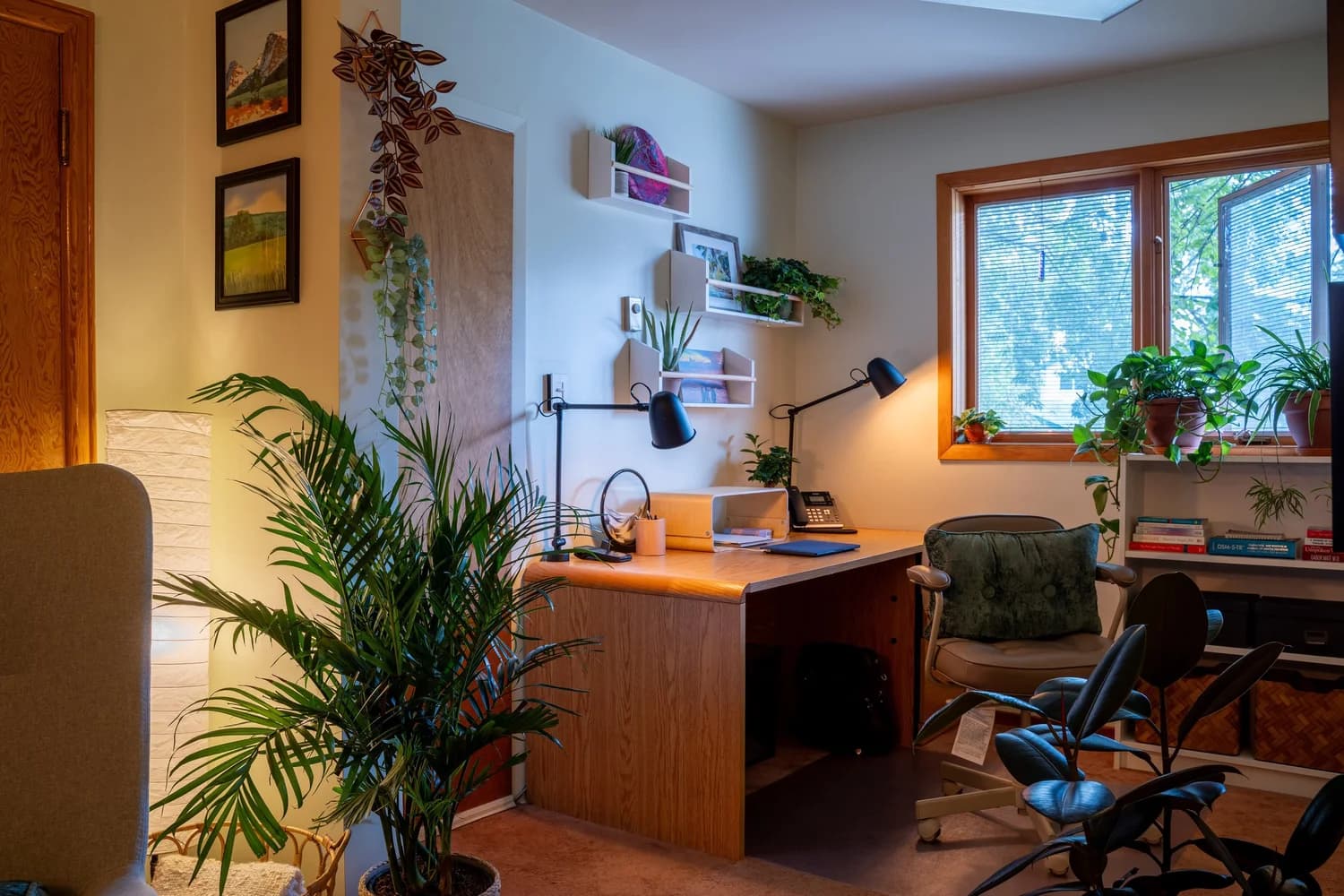 Garrett's calm home office set up for online therapy sessions