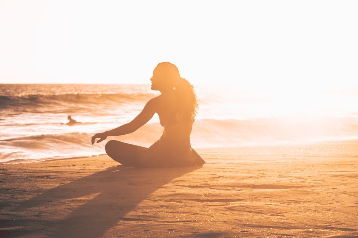 A person breathing calmly at sunrise during anxiety therapy in Edmonton