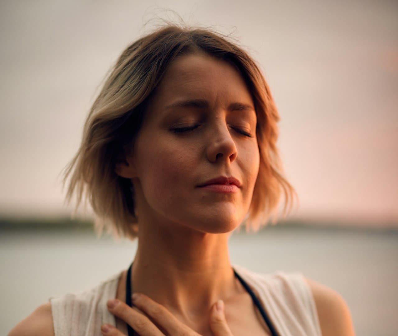 A person calmly reprocessing emotion during EMDR therapy in Edmonton